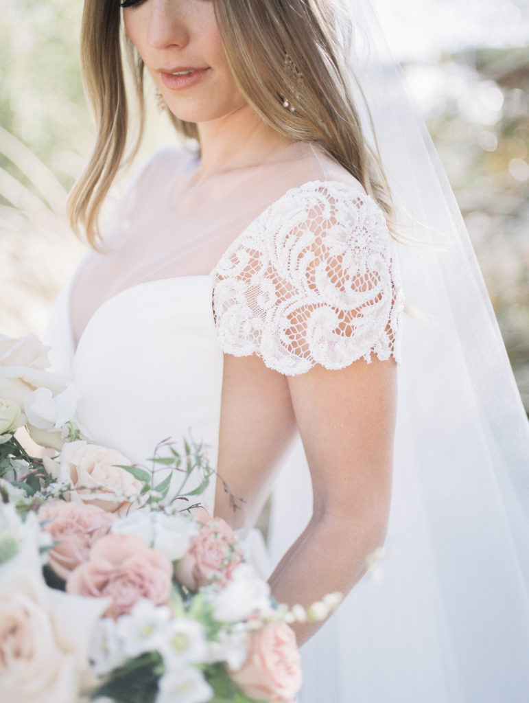 springs preserve wedding, bride with wedding bouquet and lace gown